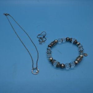 Necklace, earrings and bracelet.